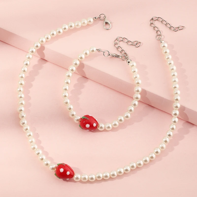 

Wholesale Fashion Pearl Necklace Strawberry Necklace Chunky Pearl Necklace Bracelet Jewelry Set For Girls