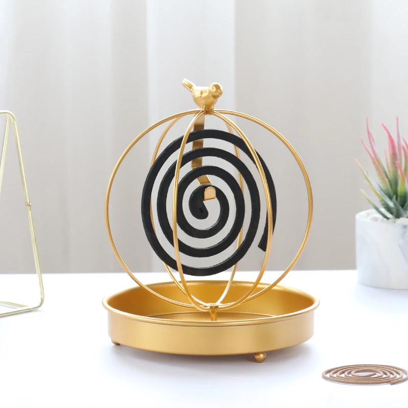 

Wholesale light luxury wrought iron golden mosquito coil holder for household use Sandalwood Ash Shelf