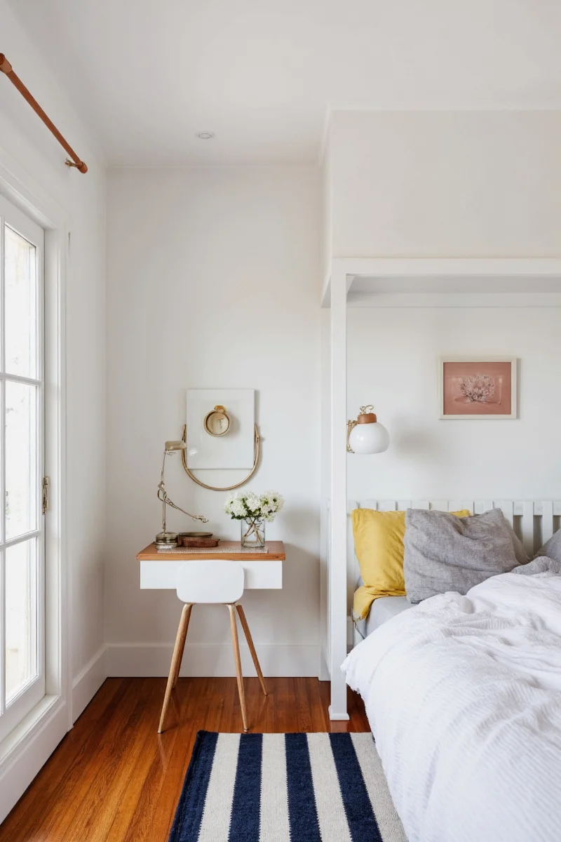 Creative lighting fixtures in a small bedroom