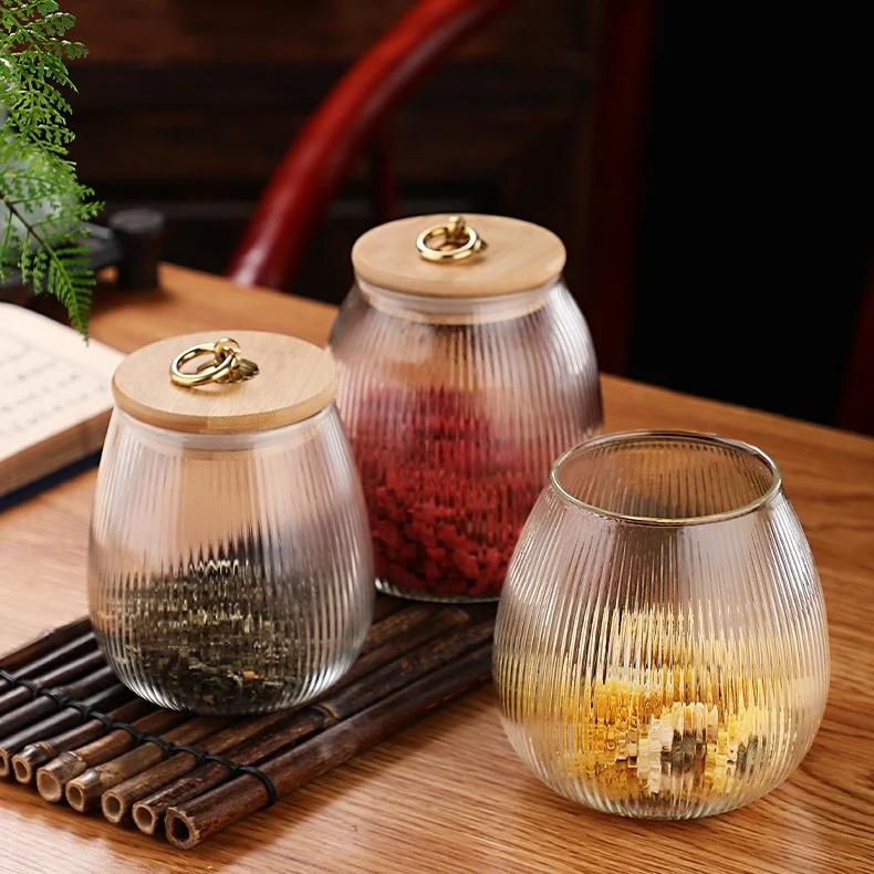 

Bulk Ribbed Details High Borosilicate Glass Jar Storage Container Bamboo Lid with Metal Hanging