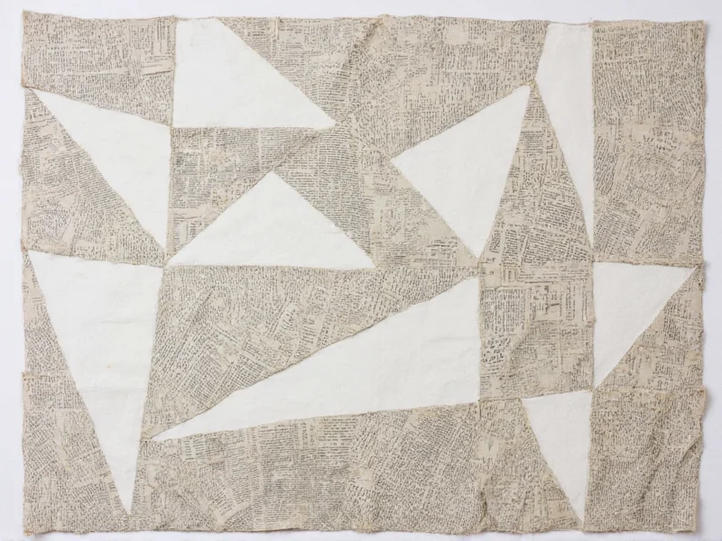 Recycled newspaper transformed into geometric wall art