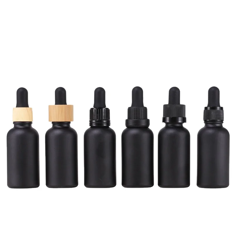 

Customization essential oil bottle light-proof liquid bottle with bamboo lid 30ML matte black dropper bottle