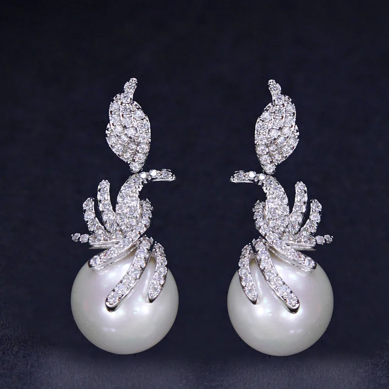 

Earring Supplier Wholesale Luxury Jewelry Zirconia Snowflake Women Big Pearl Stud Earrings