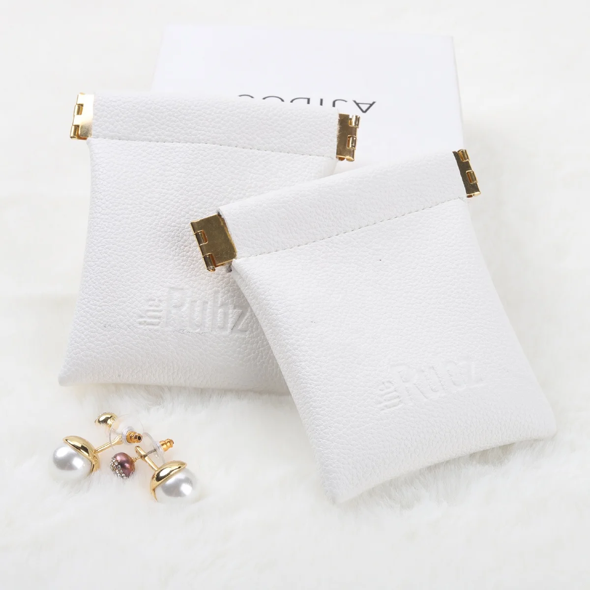 

Custom Emboss Logo Mini Coin Purse Leather Gift Pouch With Magnet Pu Leather Earplugs Watch Jewelry Bag