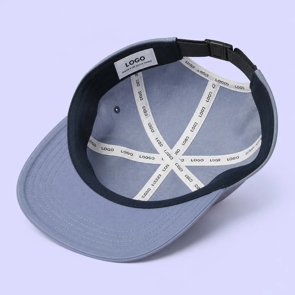 Interior View of 5-Panel Cap Showing Custom Cross-Seam Taping and Nylon Webbing Back Buckle