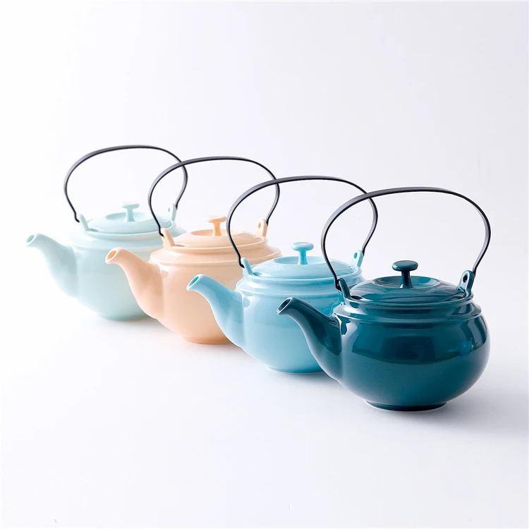 

Hot selling simple style shiny glaze custom logo cheap 750 ml ceramic tea pot with stainless steel handle, Customized color