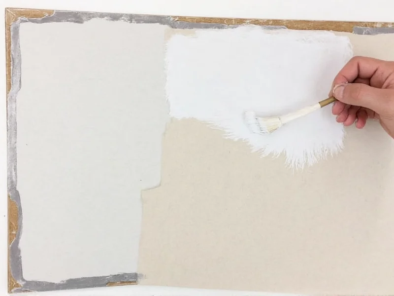 DIY dry erase board construction process showing painting step
