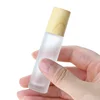 /product-detail/luxury-10ml-frosted-matte-essential-oil-glass-roller-bottle-roll-on-fragrance-oil-bottle-with-wood-grain-cap-62356296003.html