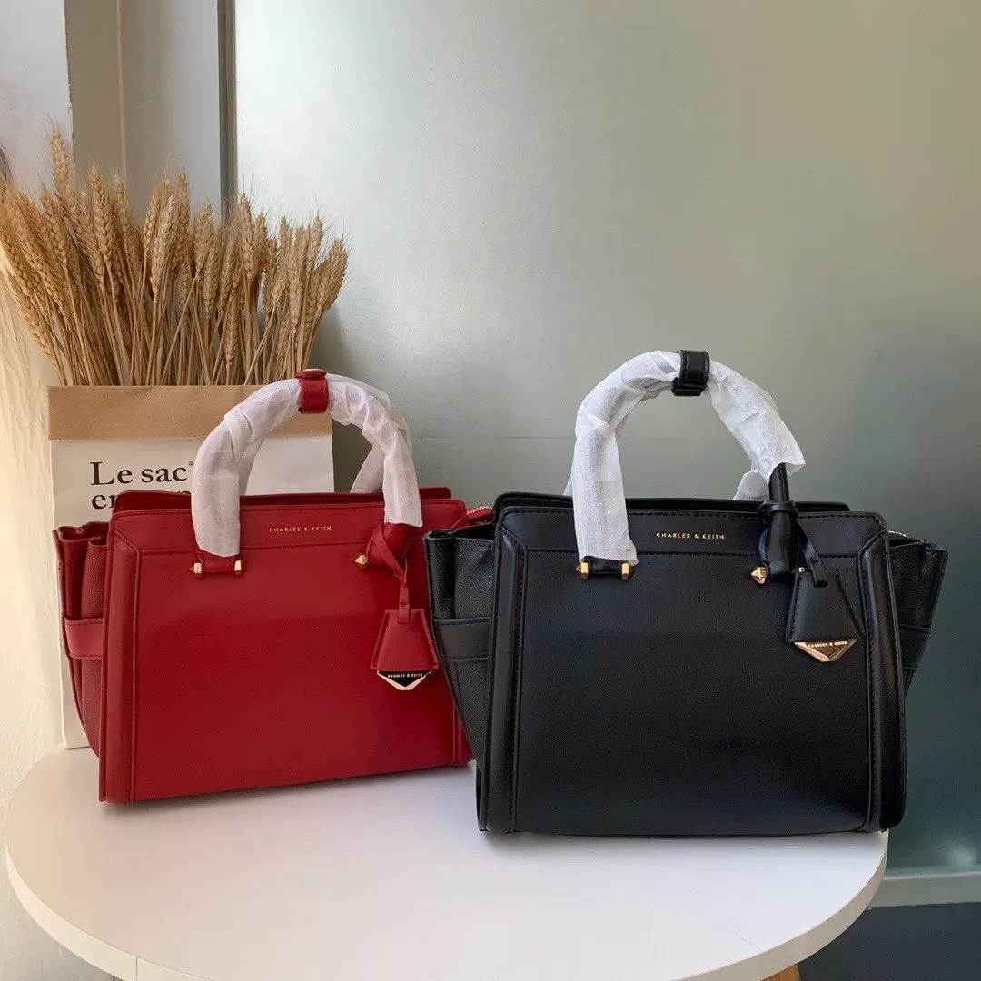 

ready stock Charles and kelth Large wings tag pendant ladies bag shoulder bag messenger bag