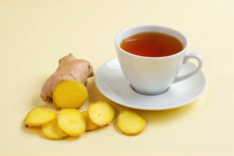 Fresh ginger root sliced with tea cup showing ginger tea preparation for bloating relief