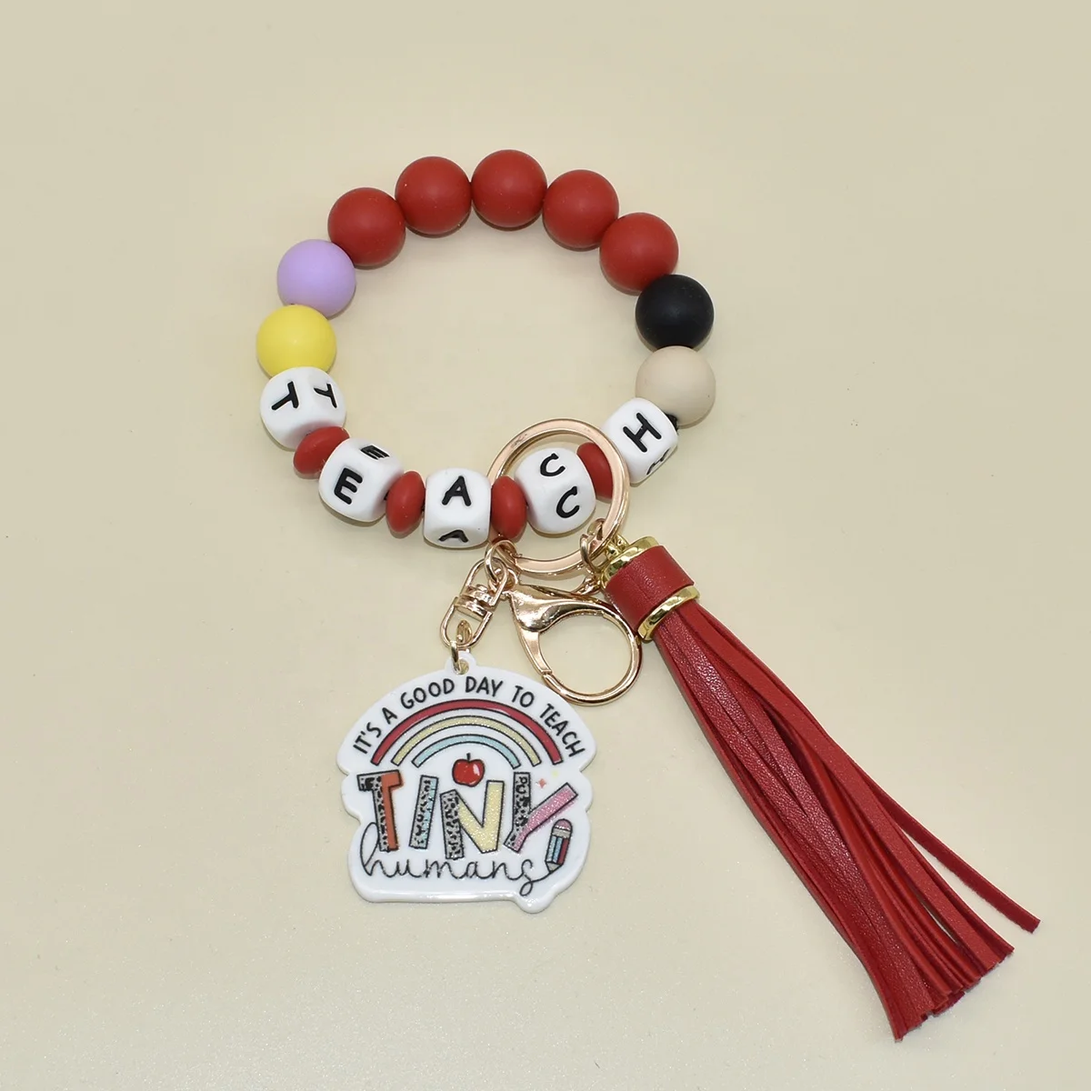 

Wofish New Design Silicone TEACH with TINY charms wristlet keychain