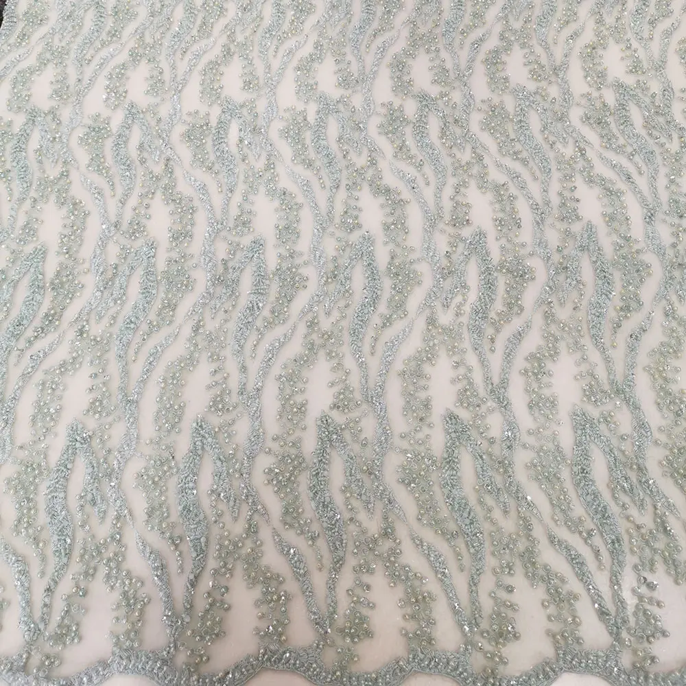 

Wholesale High Quality Light Green Beaded Handmade Lace Fabric For Dress, Customized