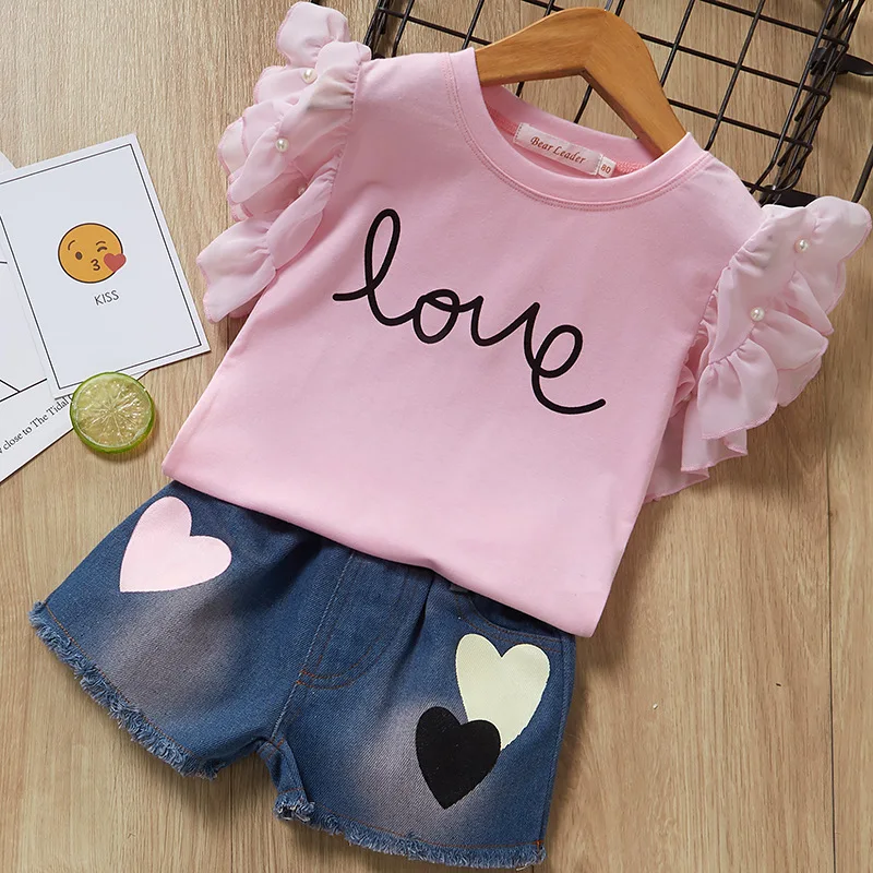 

2021 Summer Hot Selling Girl Pearl Flying Sleeve Print Love T-shirt + Jeans Short Pants Clothing Sets For Kids