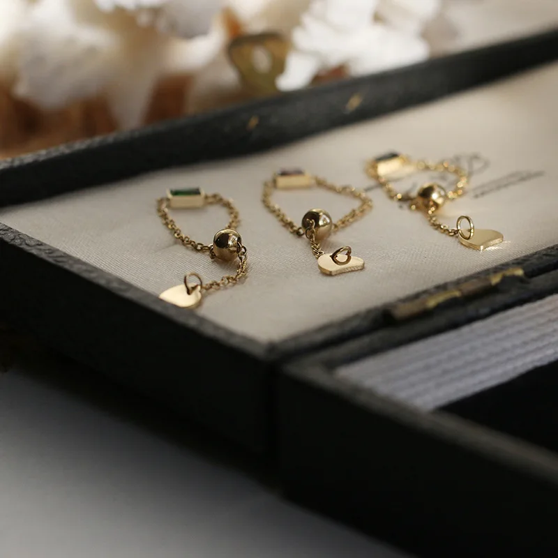 

Shangjie OEM anillos Wholesale Stainless Steel Rings Unique Colorful Zircon Gold Plated Rings Chain Adjustable Rings for Women