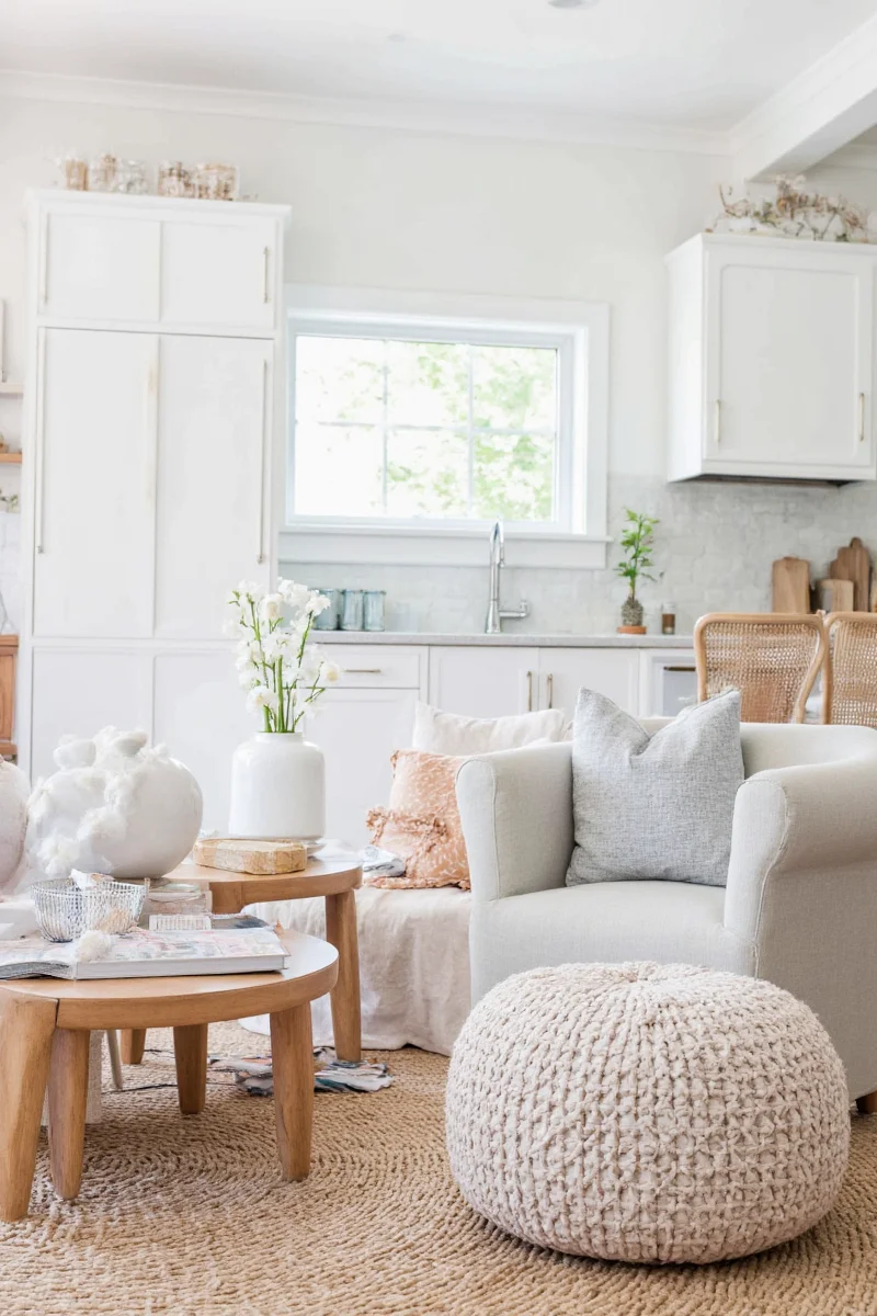 Cozy bedroom corner featuring a pouf