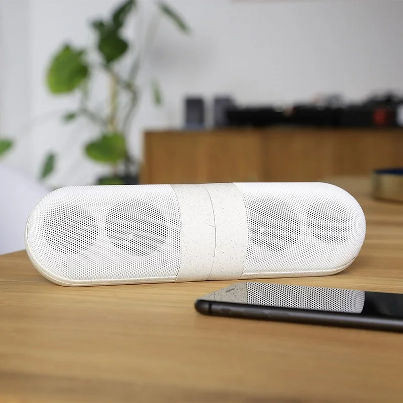 

2021 Eco Friendly Blue tooth Speaker Twin Magnetic Connected BT speaker Capsue Shaped single sound bar