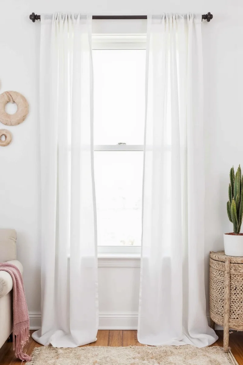 Step-by-step tutorial showing how to hang curtains using command strips