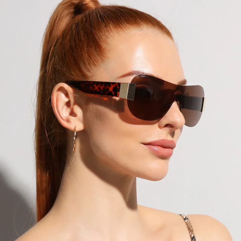 

2023 New Fashion Custom Shades Sunglasses Uv400 Gafas De Sol Outdoor Designer Metal Legs Rimless One Piece Sunglasses