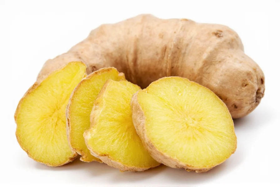 Fresh ginger root with sliced pieces showing fibrous interior and bioactive compounds