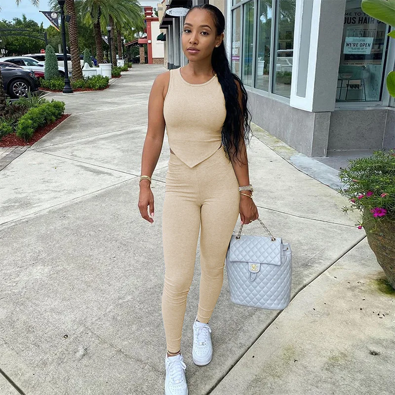 

2021 Casual Sleeveless Solid Color Irregular Workout Top And Trousers 2 Piece Fall Pant Sets Woman