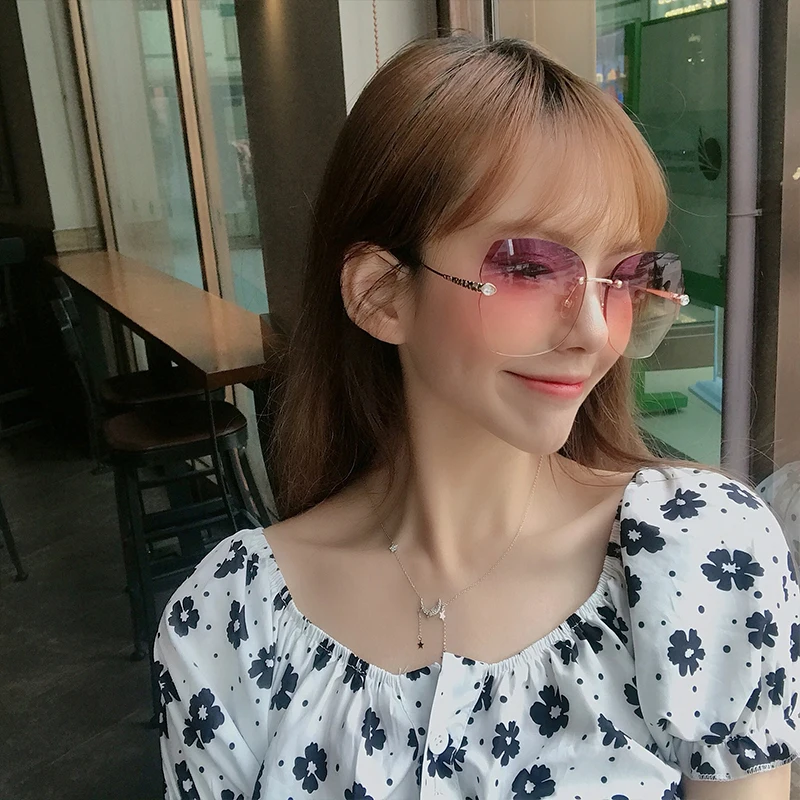 

irregular gradient blue lens rimless glasses metal sunglasses