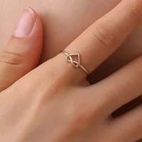 

Korean knot opening ring female Japanese and Korean temperament simple new hollow heart love ring