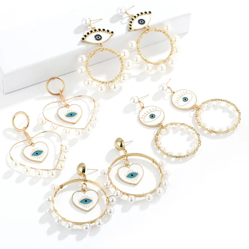 

Fashion New Design White Statement Evil Eyes Earrings Handmade Gold Round Heart Pearl Pendant Earrings For Women Girls, Picture
