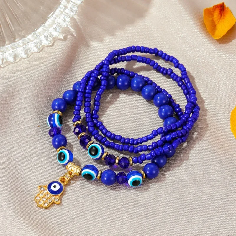 

New 4PCS Elastic beads Beaded Black Bracelet Demon evil blue Eye Bracelet Set Man Woman Jewelry