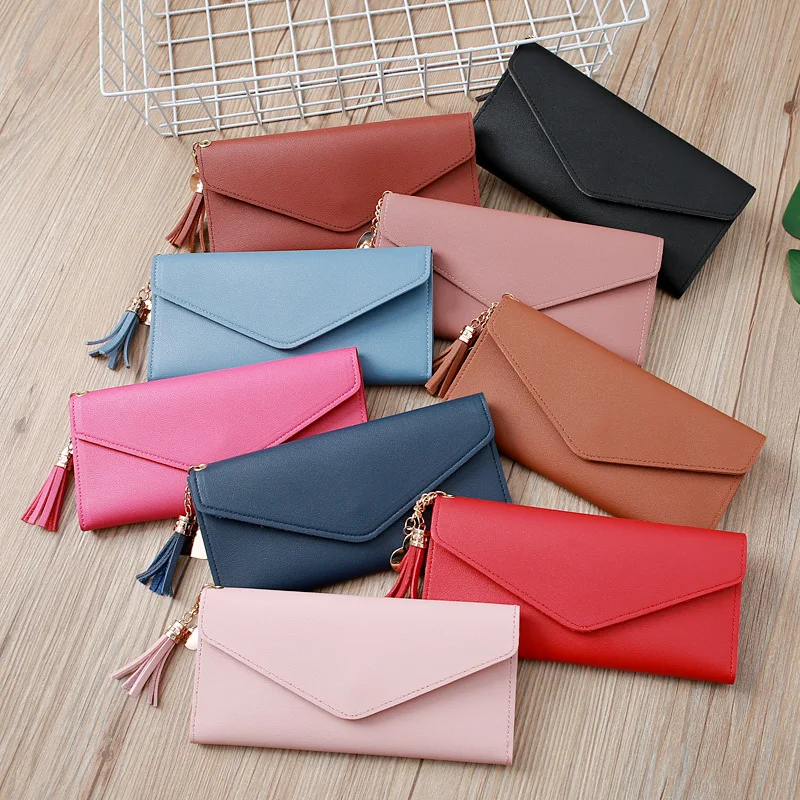 

New ladies wallets long wallets women clutch bag Simple love tassel buckle wallet