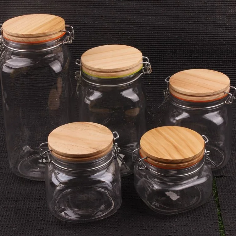 

glass honey mason jar with clip lid glass square storage jar with wooden lid and spoon, High transparency and any color you want