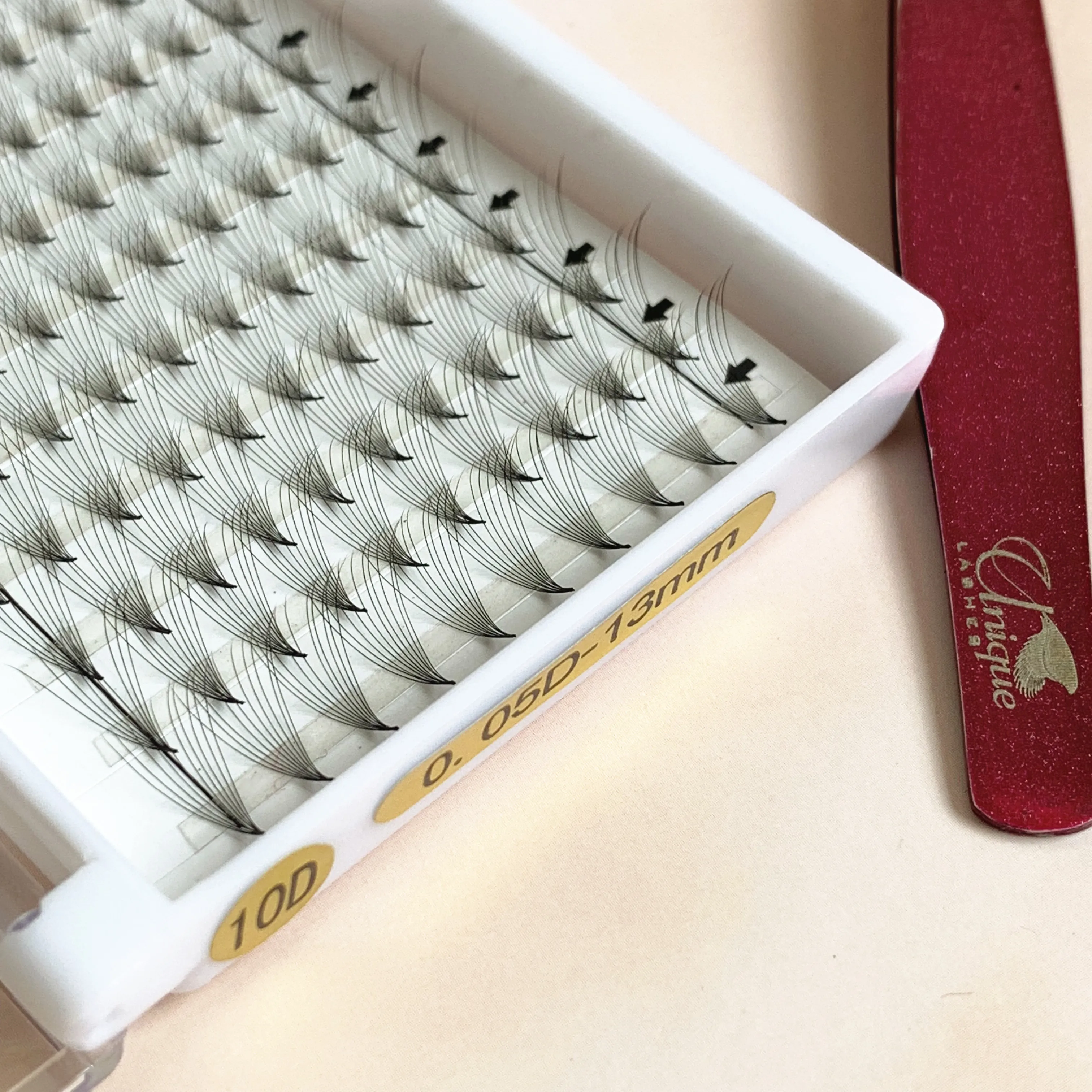 

Best Seller Unique Lashes 10D 0.05mm Pre-fanned thin slim base Lashes premade Volume Fans for Professional