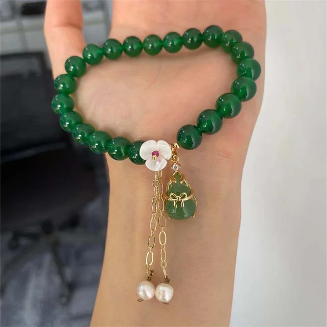 

Natural jade 14K gold - clad women's pendant Natural shell flower jade water drop bracelet, 1 different color