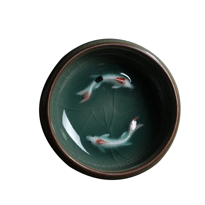

Kung Fu tea cup celadon tea set small fish shaped tea cup, Cyan