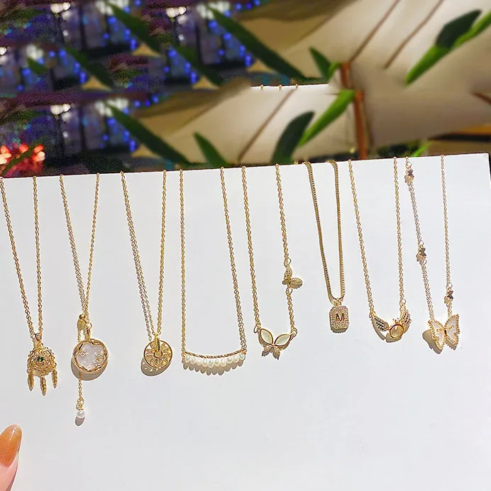 

Titanium Chain Stainless Steel Jewelry Gold Plated Necklace Copper Heart Butterfly Pendent Shell Mermaid Statement Necklaces