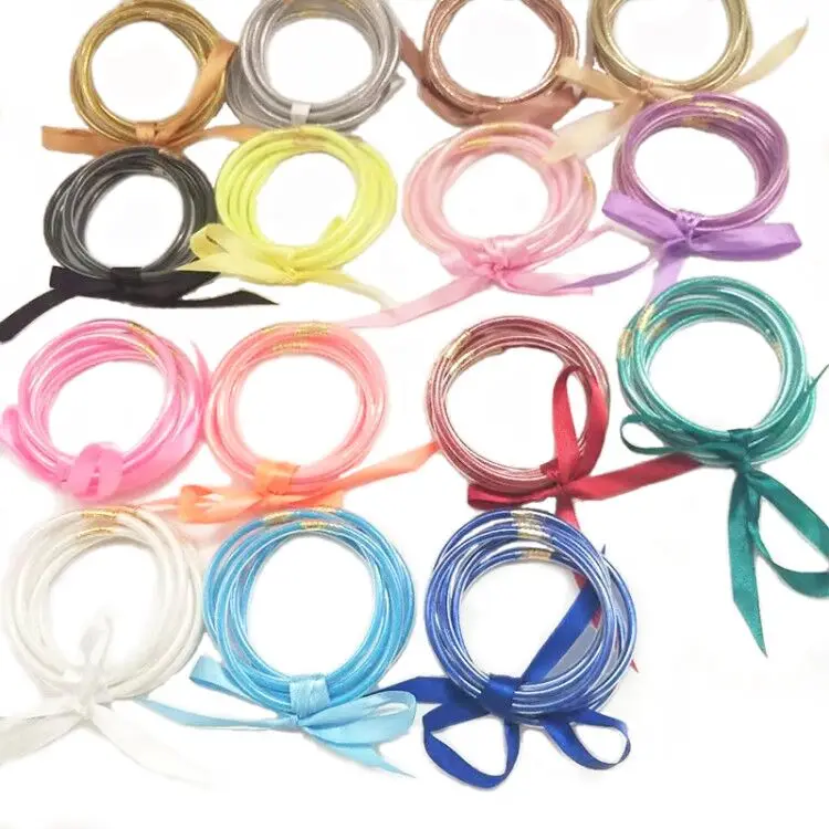 

Zooying 2019 Wholesale Bowknot Silicone Christmas Bracelets Glitter Filled Jelly Friendship Bangle for girls, Blue;white;red;pink;yellow;gold;gray