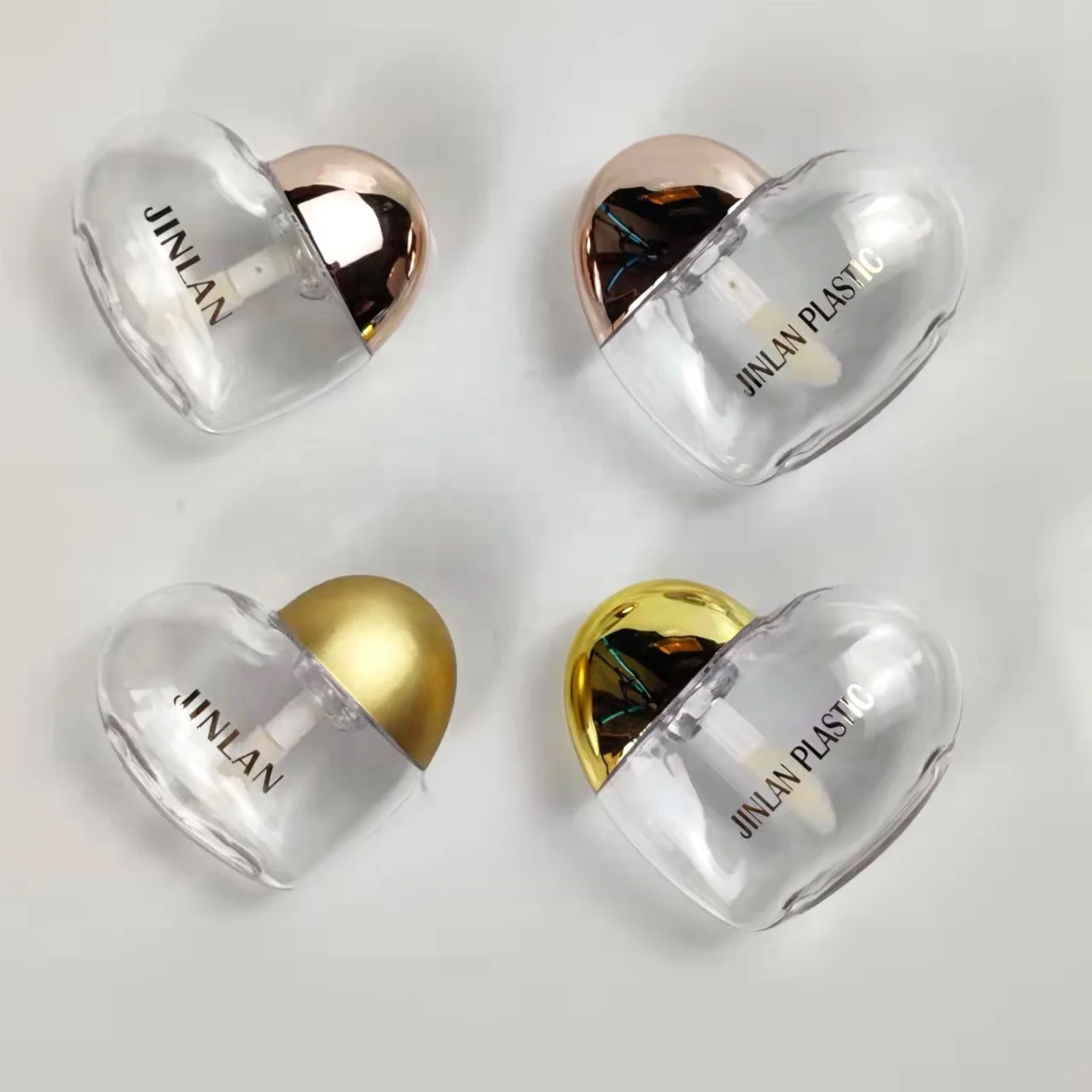 

High Quality Holographic Lip Gloss Tube Clear Empty Gold 9.8ml 6.6ml Heart Shape Lip Gloss Tubes Custom Logo Lip Balm Tube