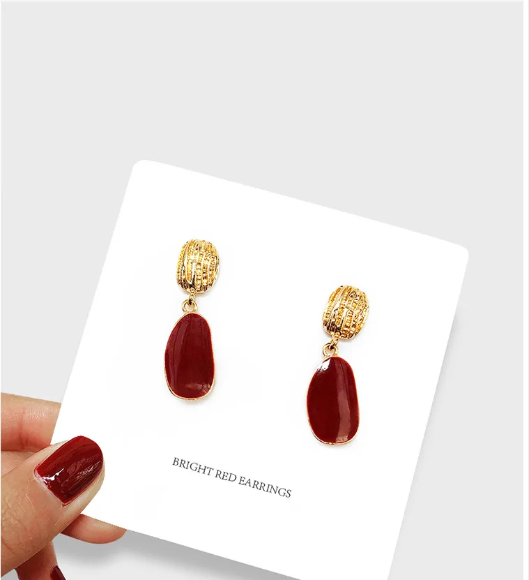 

Korean geometric temperament small earrings female retro wine red new irregular oval earrings