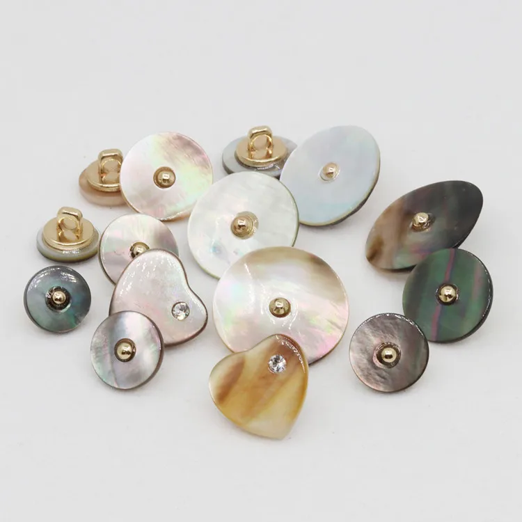 

The manufacturer sells customized natural black-and-white hand sewn shell buttons of various sizes for sewing clothes