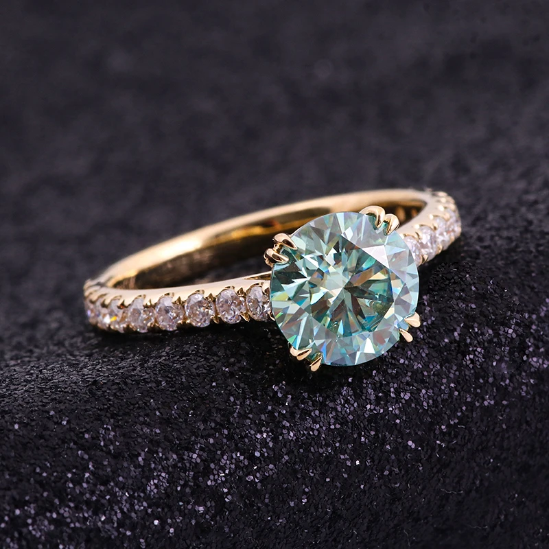 

Sweet and lovely 1.5 carat weight round cut blue & green moissanite diamond ring in 10k yellow gold paved setting, Def color