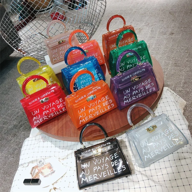 

Ins Hot Selling Fashion Pvc Candy Color Shopping Tote Bag Custom Transparent Purses And Handbags For Women Luxury