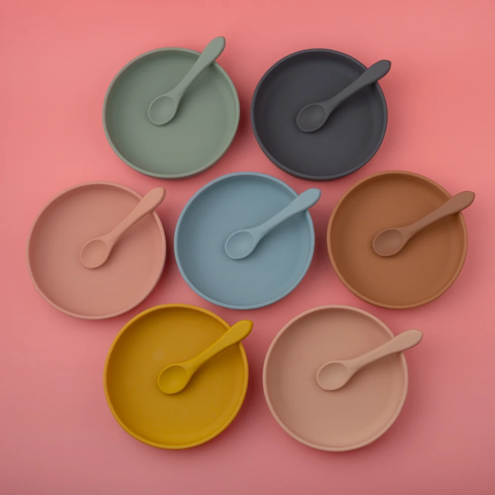 

Wholesale Baby Feeding Round shaped Silicone suction dinner plates for children with spoon