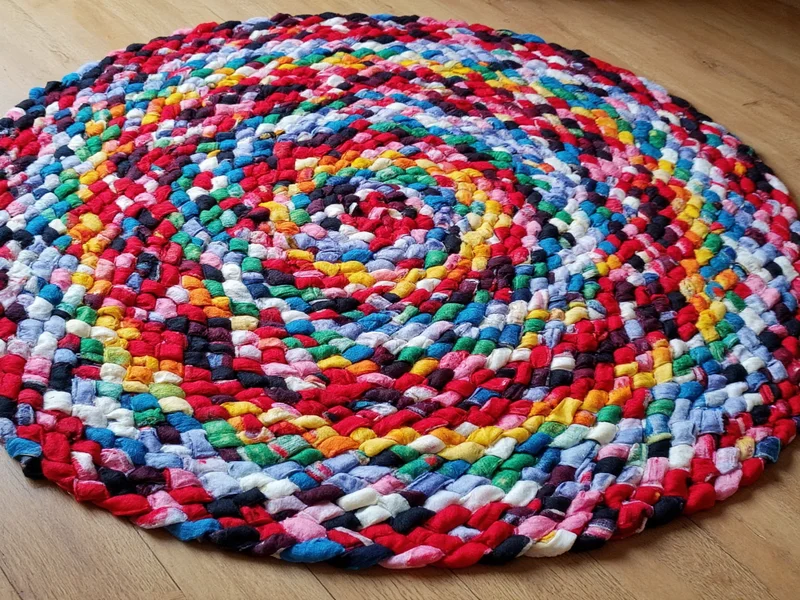Colorful braided rug made from upcycled t-shirt strips