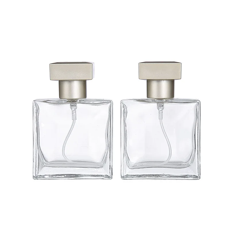 

High-end customized empty 25ml 50ml clear square perfume glass spray bottles