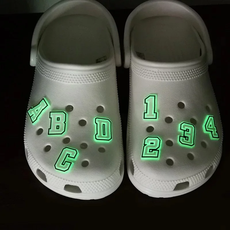 

Wholesale glowing up in the dark shoe lace croc charms glow charms clog pvc soft Shoe decoration Letters and numbers