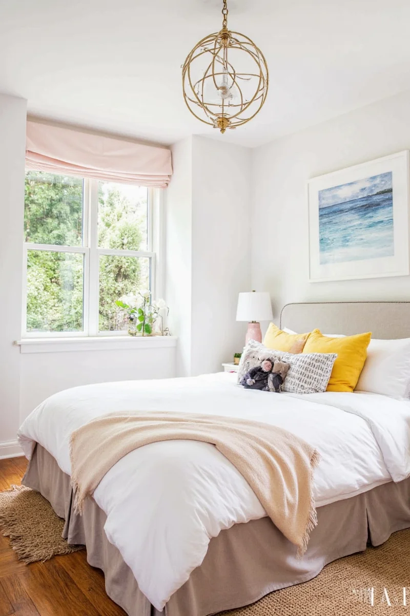 White bed with underbed storage drawers for toys and books