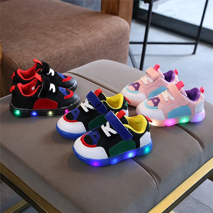 

Wholesale new light-on kids LED sports shoes for boys and girls, Black, white, red