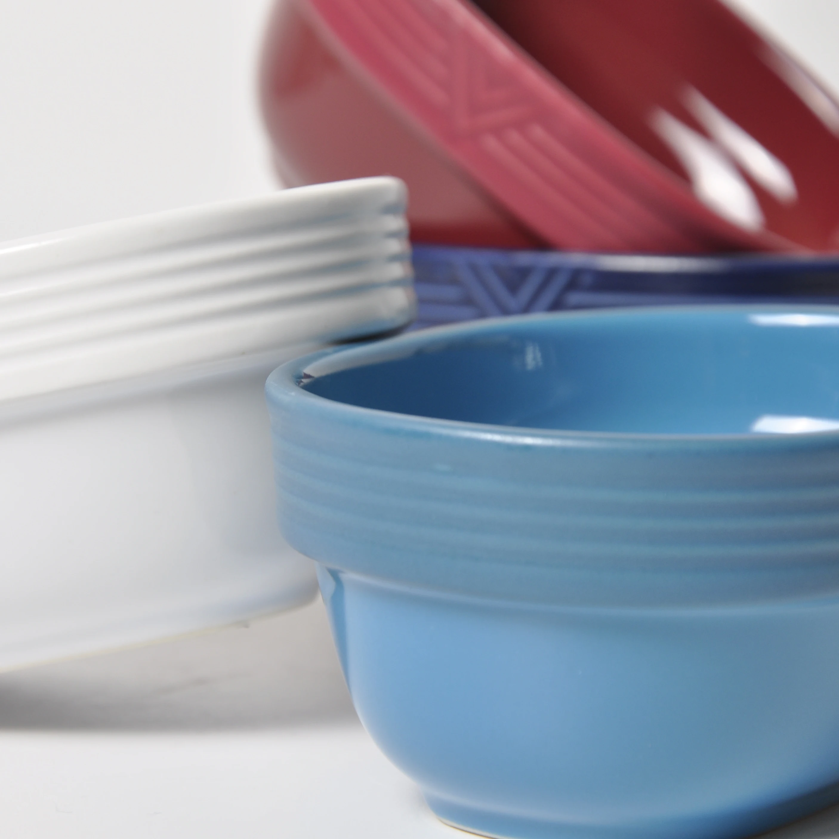 
New Design Colored Glaze Relievo Intagkio Oval Creamic Dinner Bowls Luxury Ceramic Bowl 