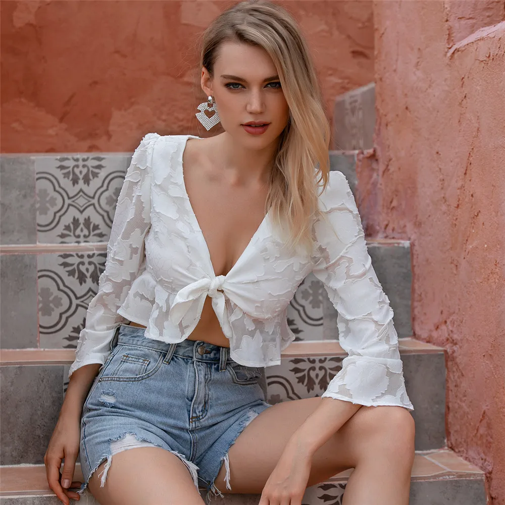 

DM womens apparel manufacturer Tie Front Ruffle Hem white color Jacquard Top, Shown