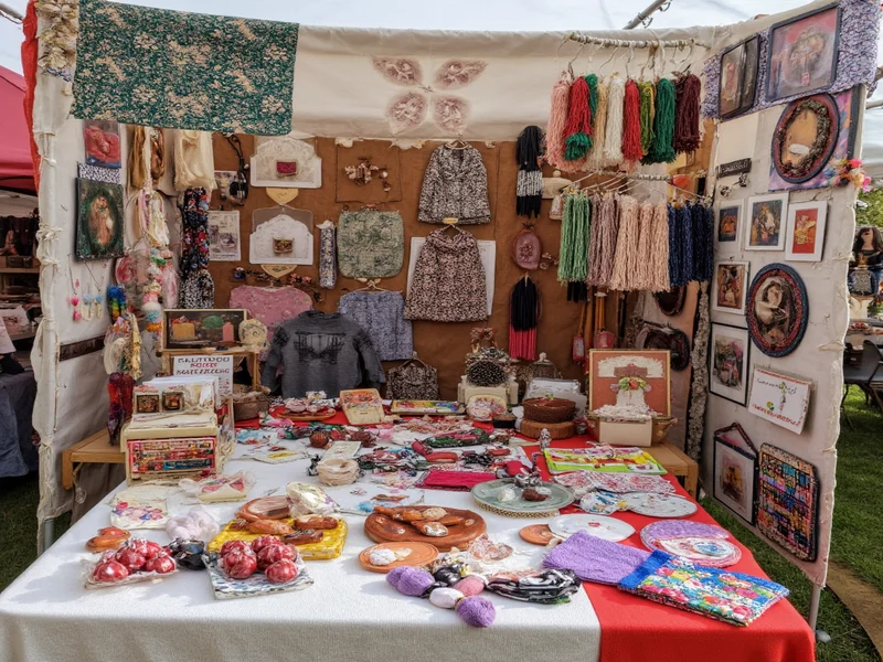 Handmade products displayed at successful craft fair booth
