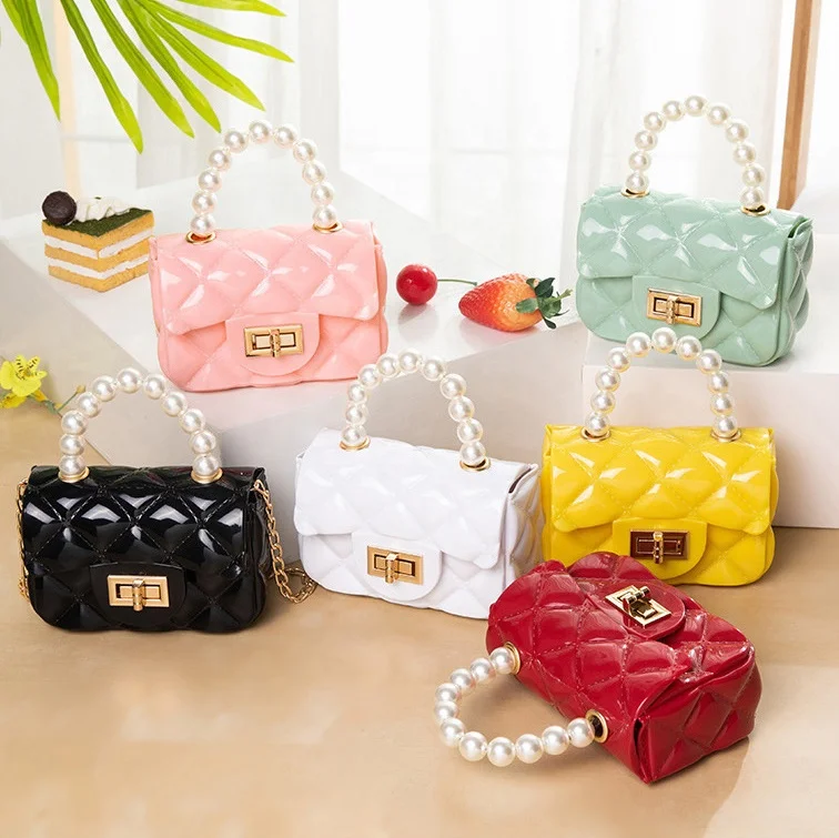 

2021 New Cute little girls fashion designer purses kids pvc jelly handbag girl crossbody bag with pearl handle purse
